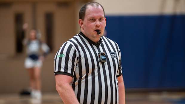 WIAA/WOA body camera photo with basketball referees